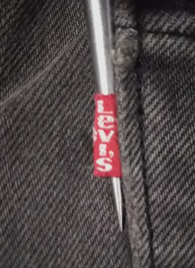 Red tab "Small e" of 1990s Levi's 501 Made in USA 1992 made Black W31-32 L33